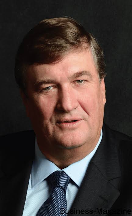 Close editorial portrait of Arnaud Dalais against a dark background